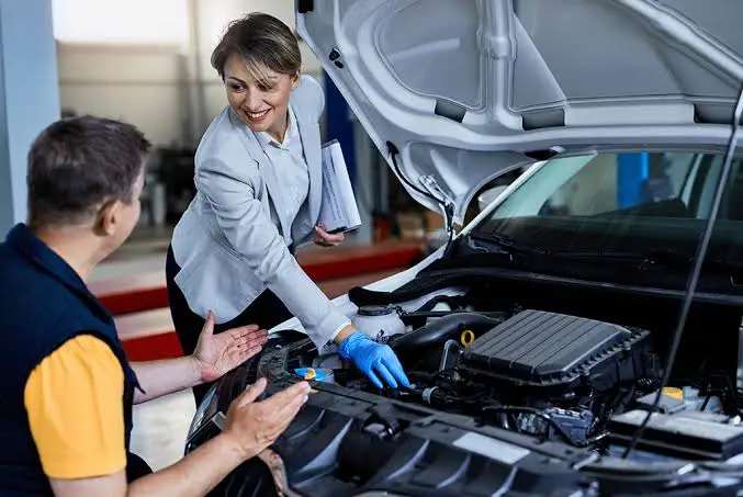 An Astute Automotive inspector carrying out a mobile roadworthy inspection at a customer address in Windsor.